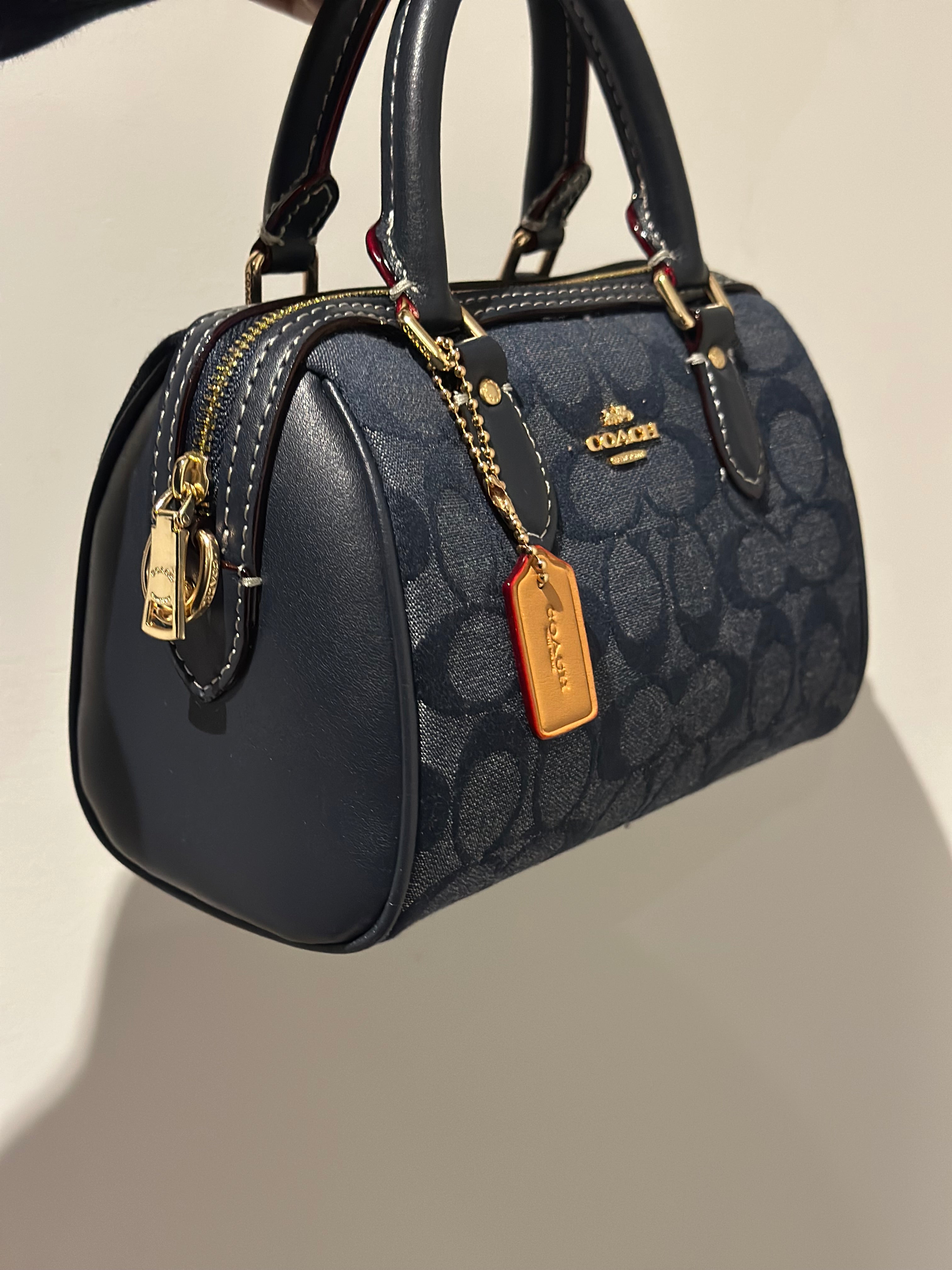 Mini Rowan Satchel in the classic Signature canvas in Denim blue Cross body strap