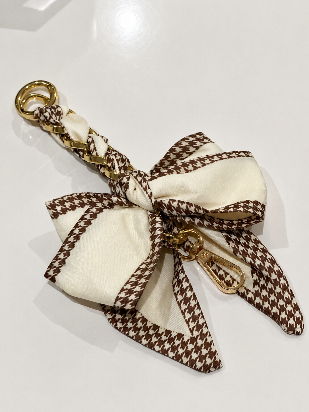 Bow gold charm accessories extender